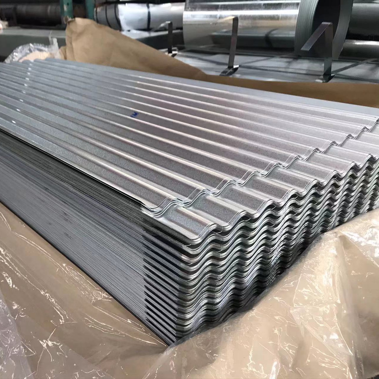 Corrugated steel sheet for roofing applications